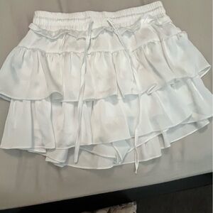 White ruffle mini skirt